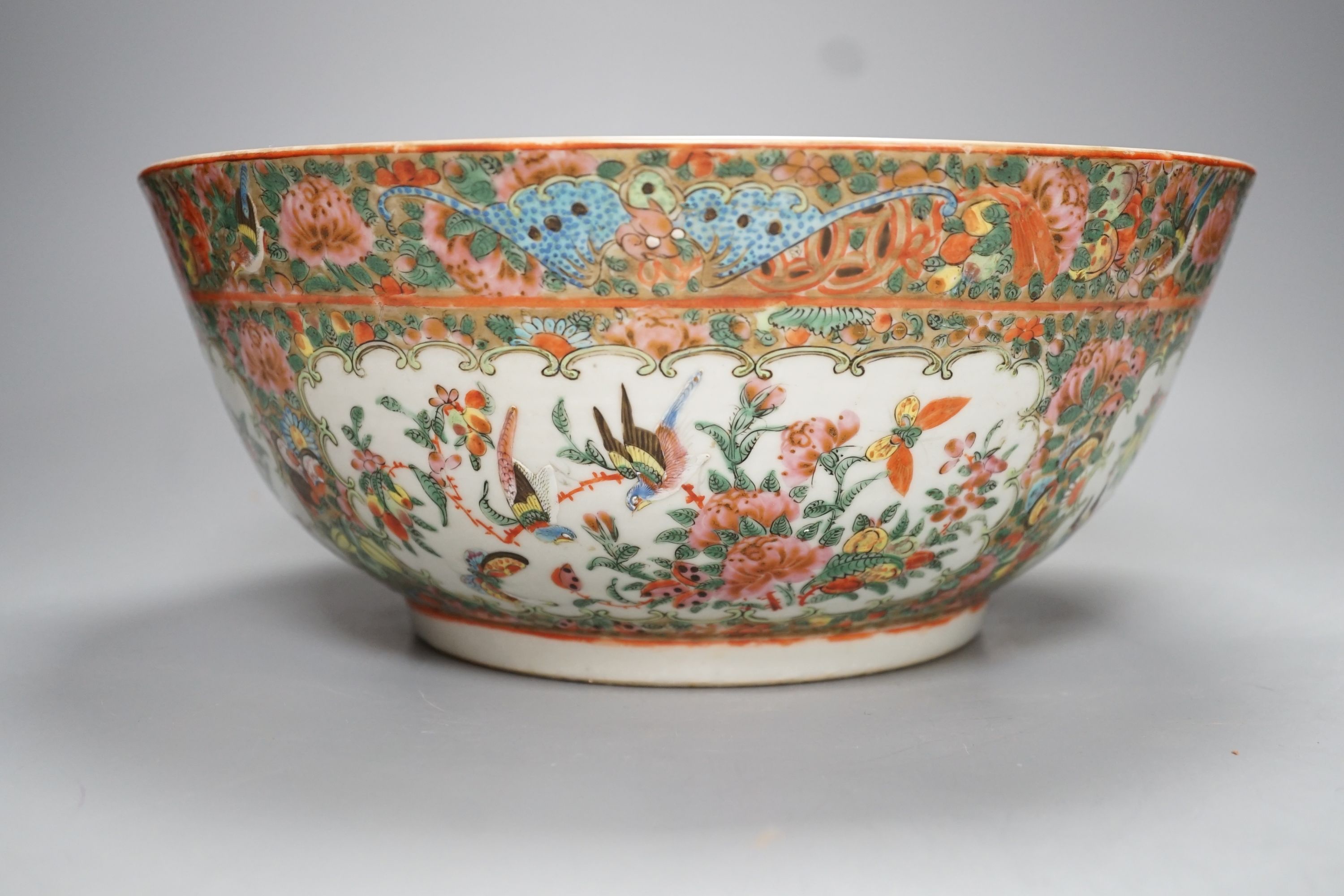 A late 19th century Chinese famille rose punch bowl - 29cm diameter